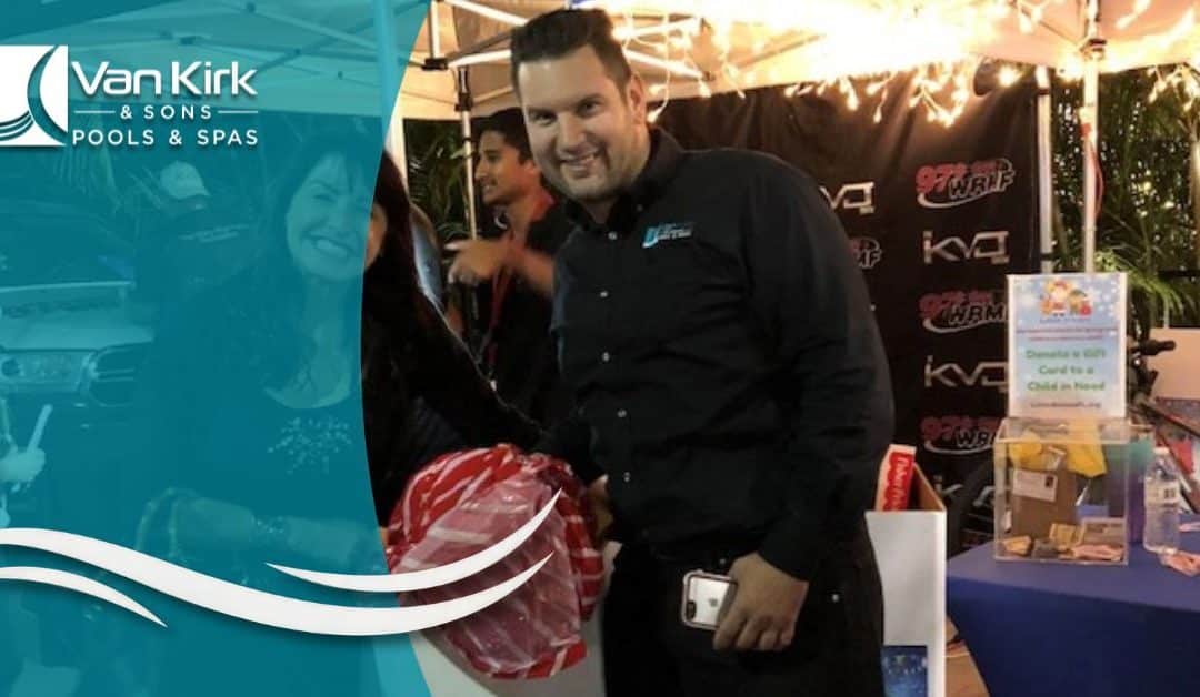 Van Kirk & Sons Pools & Spas Donates Unwrapped Toys for Little Smiles Charity Organization at the Vanilla Ice Winterfest Holiday Block Party in Wellington, Florida.