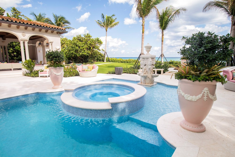 a hot tub waterfall that goes into a swimming pool - Van Kirk & Sons Pools & Spas a hot tub waterfall that goes into a swimming pool