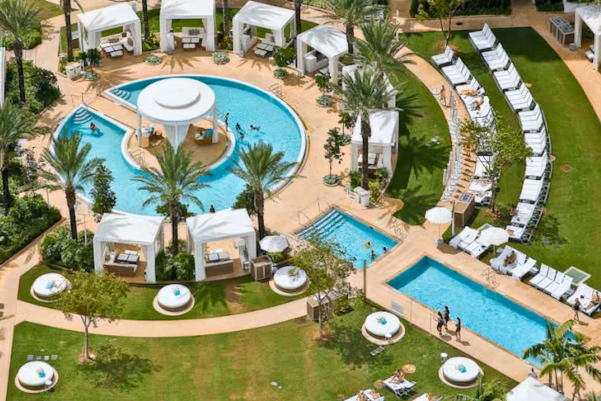 An aerial view shows the iconic bowtie-shaped pool and luxury cabanas Van Kirk Pools' commercial division built for the Fontainebleau.