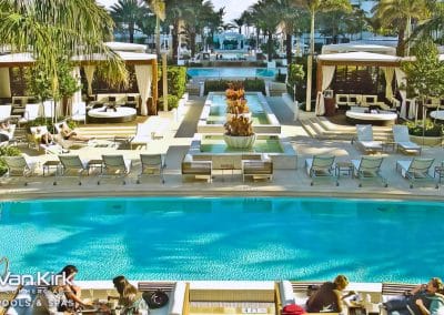Van Kirk Pools' commercial division built the iconic resort pool complex at the Fontainebleau in Miami Beach with luxury cabanas.