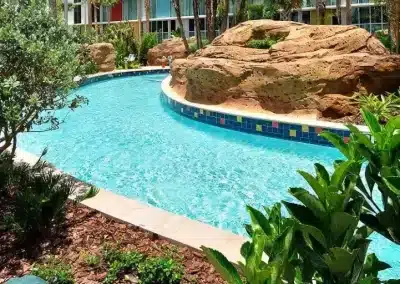 Van Kirk Pools built the winding lazy river with custom rockwork and tropical landscaping for this resort in Orlando, Florida.