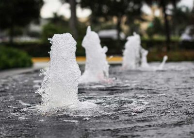 Close-up of multiple fountain jets in motion at City Furniture Boca Raton