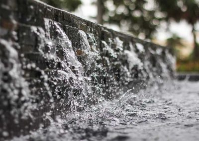 Custom-built water feature at City Furniture Boca Raton by Van Kirk Pools