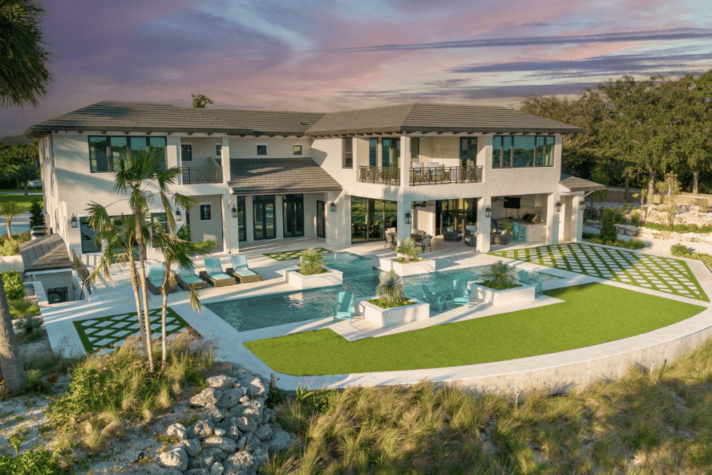 Custom geometric negative edge pool in Stuart, Florida with water features and modern landscaping.