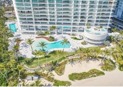 Detailed view of the architectural elevated circular spa and pool deck at Jade Signature, Sunny Isles Beach, built by Van Kirk & Sons Pools & Spas.