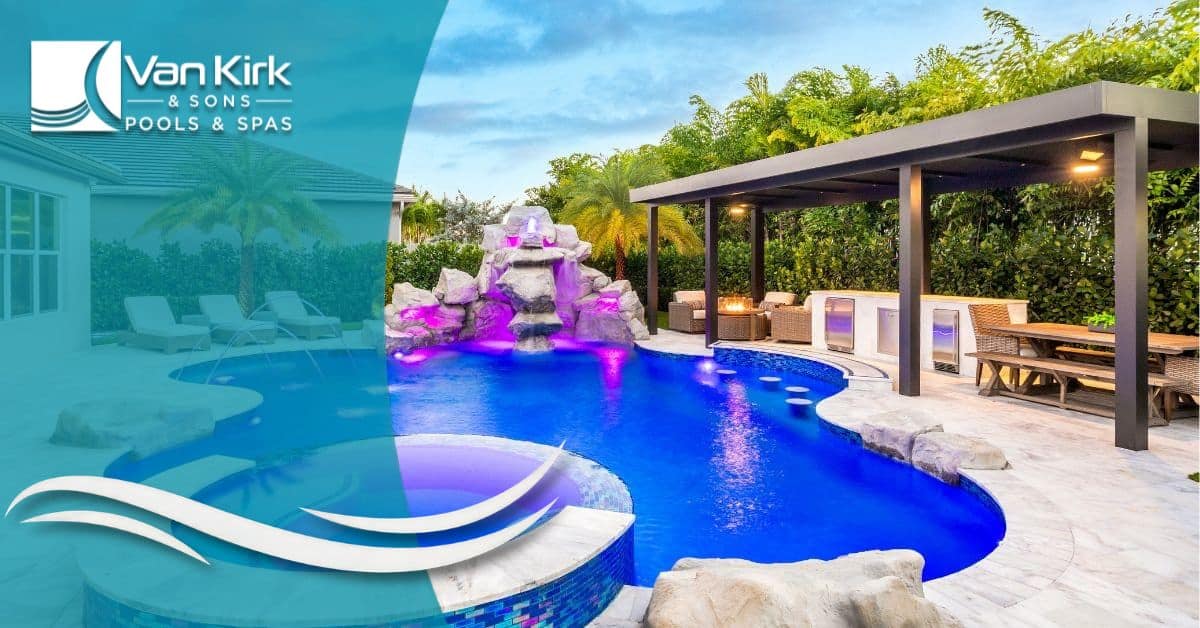 Lagoon-style pool with rock waterfall, spa, and LED lighting in Boca Raton, Florida
